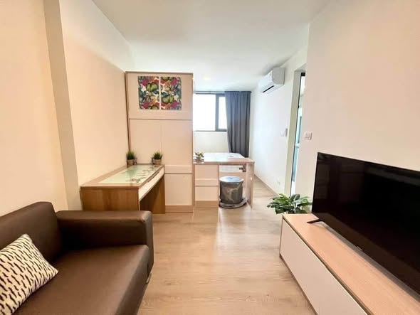 bedroom and living room of THE ORIGIN SUKHUMVIT – PRAKSA สำนักงานขายคอนโด