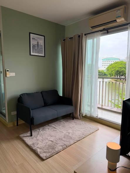 living room and bedroom of The Parkland Srinakarin Lakeside