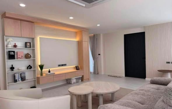 living room and bedroom of The Plot