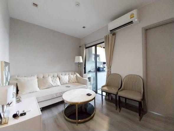 bedroom and living room of The Politan Aqua