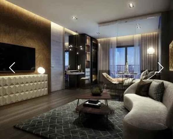 bedroom and living room of The Politan Aqua