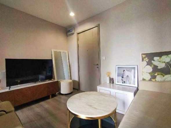 living room and bedroom of The Politan Aqua