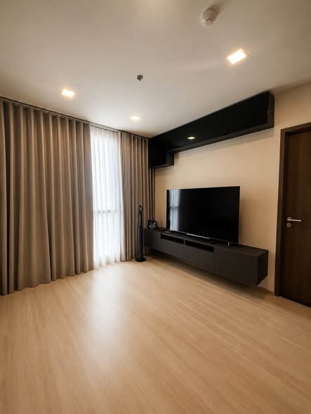 bedroom and living room of The Privacy Jatujak