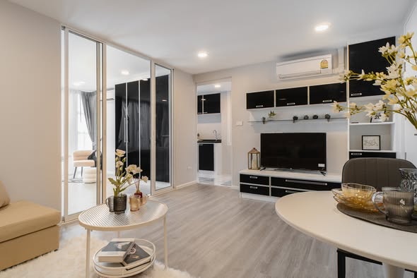 living room of The Raffles Condominium
