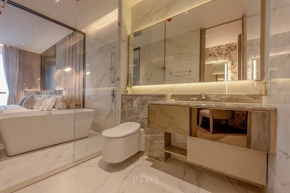 bedroom and bathroom of The Reserve Sathorn