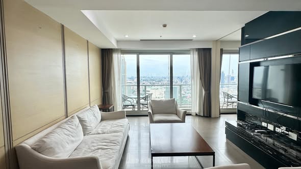 living room and bedroom of The River Condominium