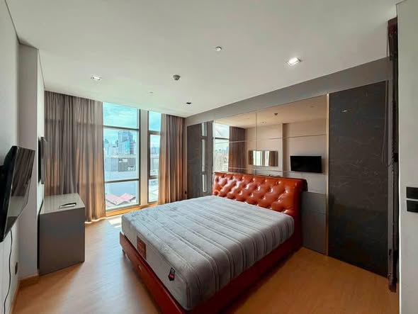 bedroom of The Room Charoenkrung 30 Condominium