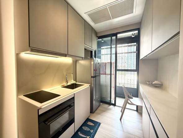 bathroom and kitchen of The Room Phaya Thai