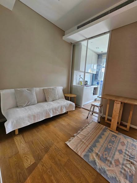 living room and bedroom of The Saint Residences