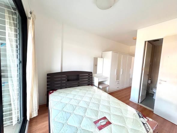 bedroom of The Sense Sukhumvit