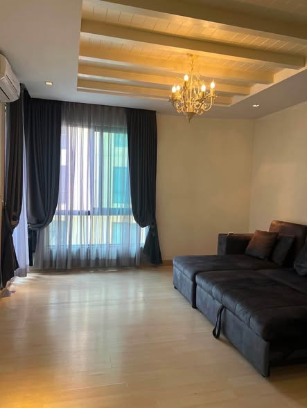 bedroom and living room of The Sense Sukhumvit