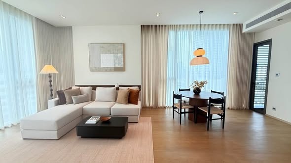 bedroom and living room of The Strand Thonglor