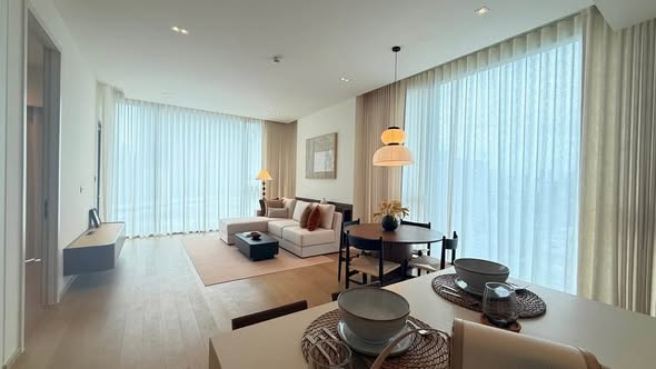 bedroom and living room of The Strand Thonglor