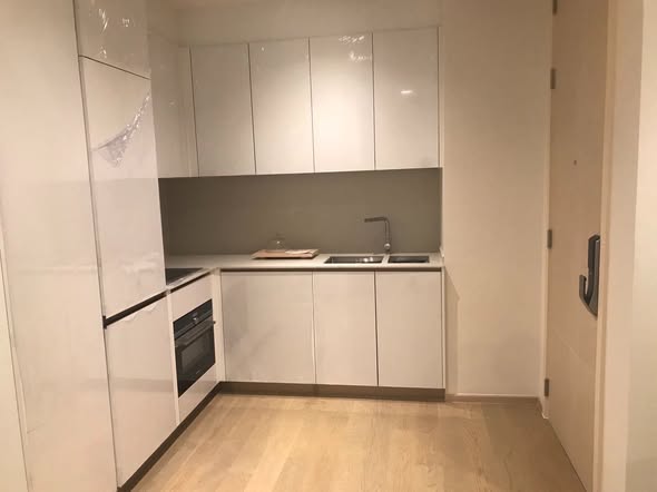 room interior and kitchen of The Strand Thonglor