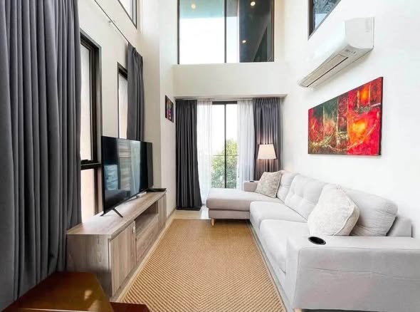 living room and bedroom of The Tree Sukhumvit 64