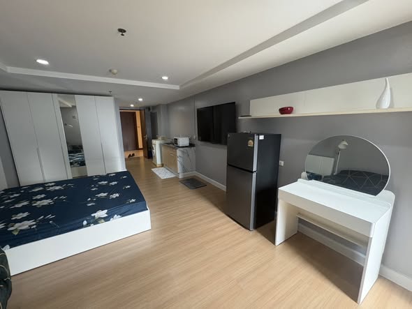 bedroom of The Trendy Condominium