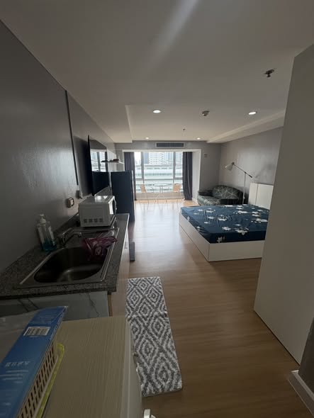 bedroom of The Trendy Condominium