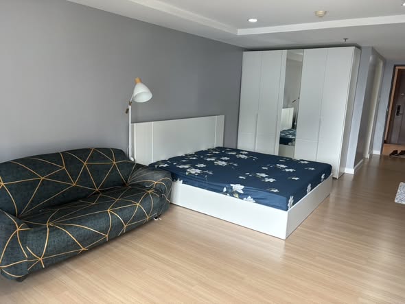 bedroom of The Trendy Condominium