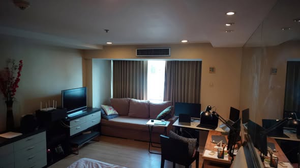 living room and bedroom of The Trendy Office Building