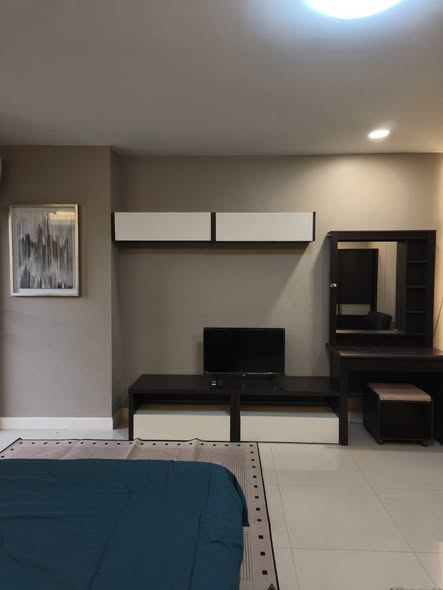 bedroom of The Trio Condo