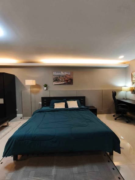bedroom of The Trio Condo