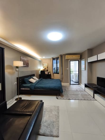 bedroom of The Trio Condo