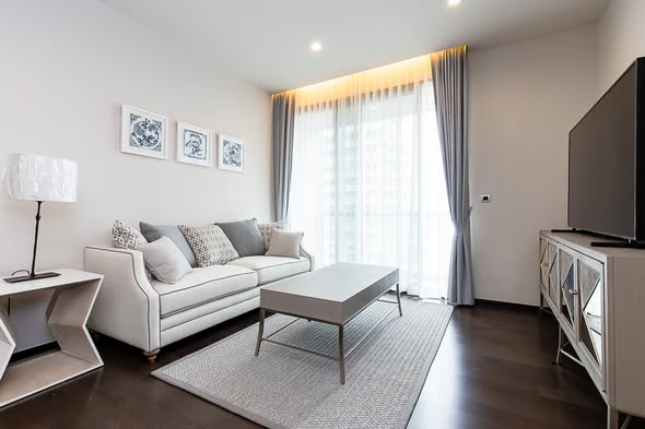 bedroom and living room of THE XXXIX
