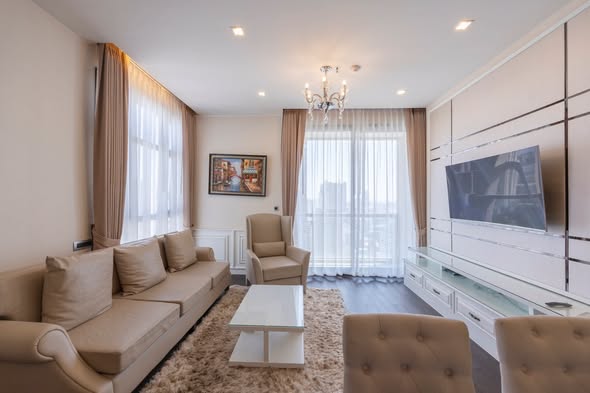 bedroom and living room of THE XXXIX