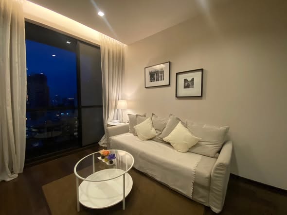 bedroom and living room of THE XXXIX