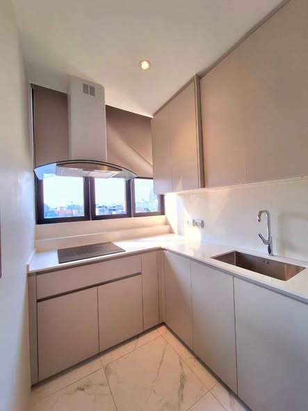 kitchen of THEA Private Suites by TH District