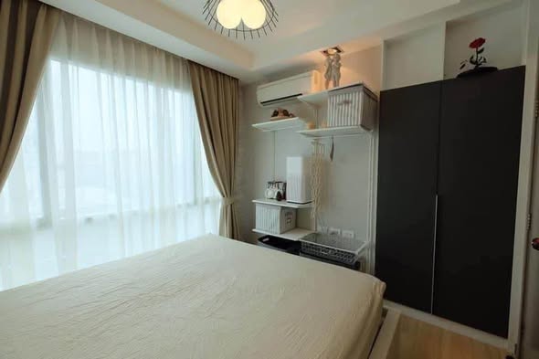 bedroom of Thru Thong Lor