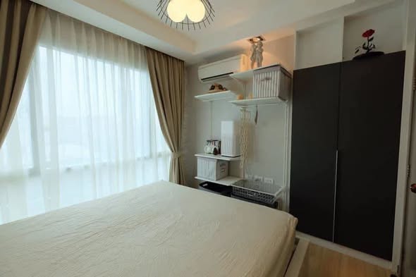 bedroom of Thru Thong Lor