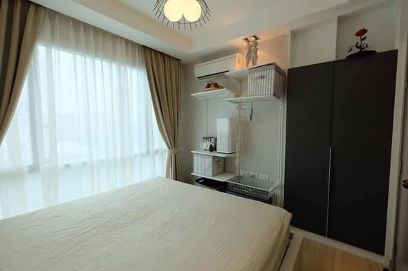 bedroom of Thru Thong Lor
