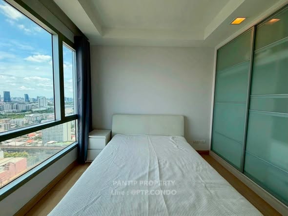 bedroom and room interior of Thru Thong Lor