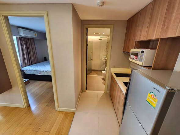 bedroom of Tidy Deluxe Condominium