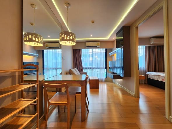 bedroom of Tidy Deluxe Condominium