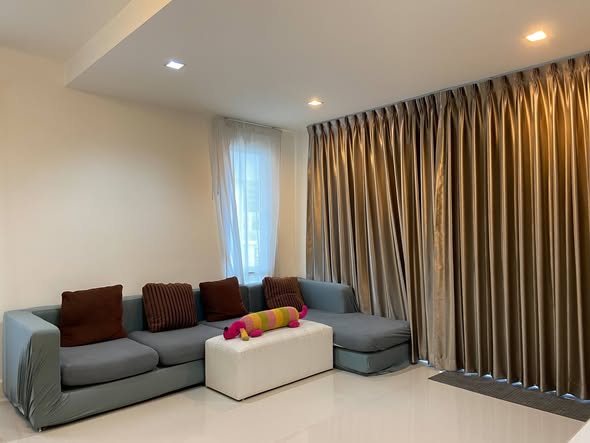 bedroom and living room of Town Avenue Srinagarin