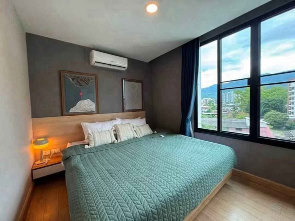 bedroom of TRAMS Condominium
