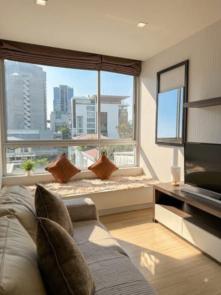 bedroom and living room of Tree Condo Sukhumvit 42