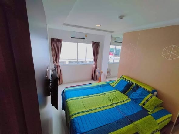 bedroom of Triogems condo