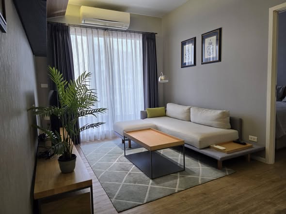 bedroom and living room of Triple Y Residence