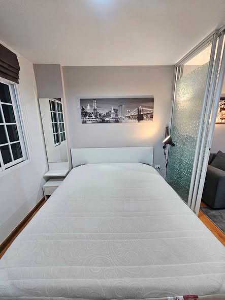 bedroom of Tulip Square Condo