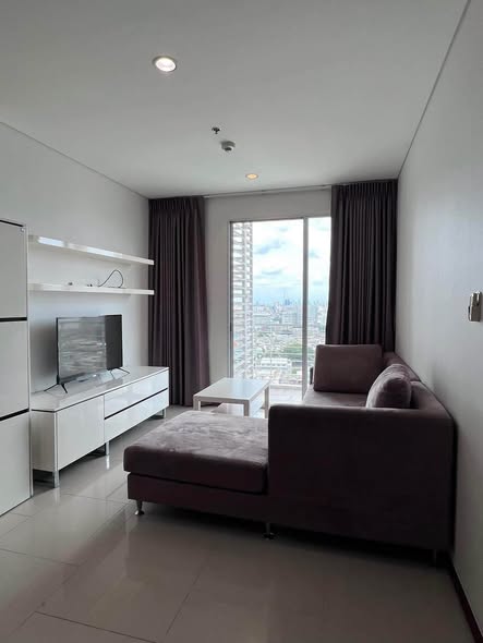 bedroom and living room of Villa Sathon Condominium