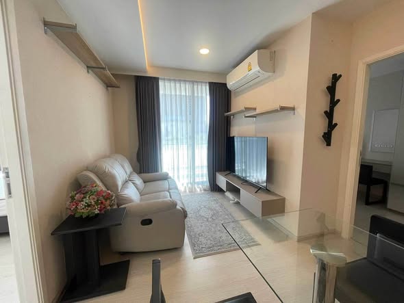 bedroom and living room of VTARA36 Condominium