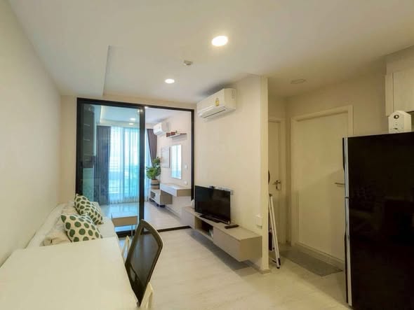 bedroom and living room of VTARA36 Condominium