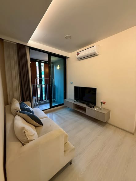 living room and bedroom of VTARA36 Condominium