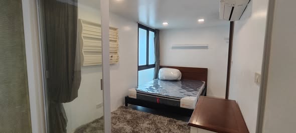 bedroom and room interior of Waters Edge Condominium