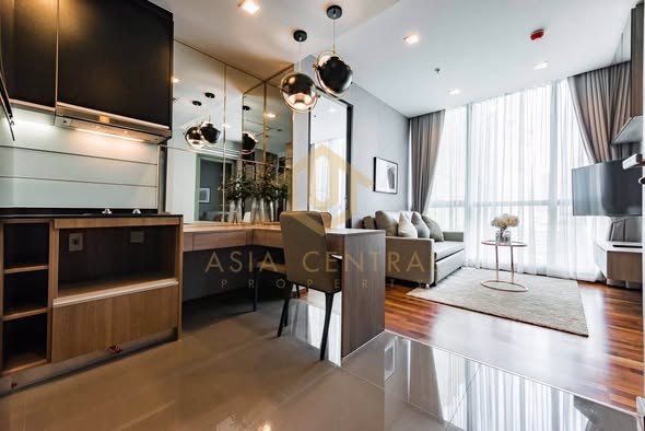 living room and bathroom of Wish Signature II Midtown Siam