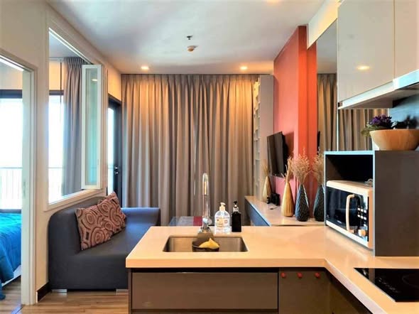 living room and bedroom of WYNE by Sansiri