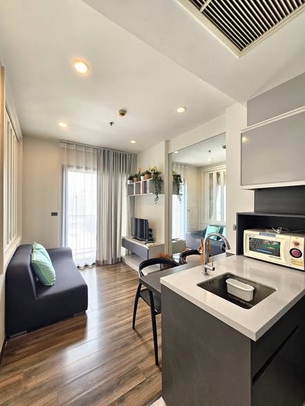 living room and kitchen of WYNE by Sansiri